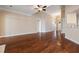 Living room boasts hardwood floors and an open-concept layout leading into the foyer, kitchen, and other rooms at 1993 Shenley Park Ln, Duluth, GA 30097