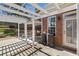 Covered patio features seating, a swing, a pergola-covered area, and view of the yard at 1993 Shenley Park Ln, Duluth, GA 30097