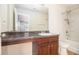 Bathroom featuring granite counters, shower, and bath combo at 2236 Bigwood Trl, Atlanta, GA 30349