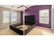 Spacious bedroom with modern bed frame, large windows, and neutral carpet at 2236 Bigwood Trl, Atlanta, GA 30349