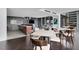 Modern lounge featuring sleek floors, a bar area, a tv and comfortable seating for tenants and guests at 855 Peachtree Ne St # 1703, Atlanta, GA 30308