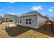A well maintained backyard with an attached patio at 165 Birch St, Hiram, GA 30141