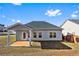 A well maintained backyard with an attached patio at 165 Birch St, Hiram, GA 30141