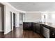 Well-designed kitchen features an island and nearby walk-in pantry at 165 Birch St, Hiram, GA 30141