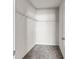 Walk-in closet featuring a metal shelving system at 165 Birch St, Hiram, GA 30141