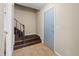 Entryway features tiled flooring, a staircase, and a storm door to the exterior at 2898 Lakemont Sw Dr, Marietta, GA 30060