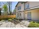 Charming two-story home with a cozy front porch, a fenced yard, and a well-maintained front yard at 2898 Lakemont Sw Dr, Marietta, GA 30060