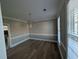 Formal dining room featuring a chandelier, wood floors, and classic trimwork at 3442 Fox Hollow Dr, Marietta, GA 30068