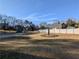 Expansive front lawn with a well-maintained tree area in a residential neighborhood at 3442 Fox Hollow Dr, Marietta, GA 30068