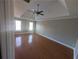 Spacious main bedroom with tray ceiling, fan and ample natural light at 3442 Fox Hollow Dr, Marietta, GA 30068