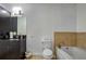 Modern bathroom with a separate bathtub, sleek vanity, and contemporary fixtures for a comfortable experience at 905 Juniper Ne St # 110, Atlanta, GA 30309