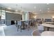 Stylish resident common area with modern furniture, decorative lighting, and bar at 905 Juniper Ne St # 110, Atlanta, GA 30309