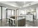 Spacious common area with modern seating, bar, and high-end kitchen appliances at 905 Juniper Ne St # 110, Atlanta, GA 30309