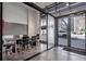 Modern conference room with floor-to-ceiling glass windows at 905 Juniper Ne St # 110, Atlanta, GA 30309