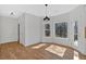 Cozy dining area featuring hardwood floors and access to the deck at 9645 Dunhill Way, Cumming, GA 30028