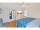 Cozy bedroom with hardwood floors and a ceiling fan provides a comfortable retreat at 2264 Winding Way, Tucker, GA 30084