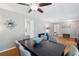 Dining area featuring a dark wood table with seating for six, hardwood floors, and views into the kitchen at 2264 Winding Way, Tucker, GA 30084