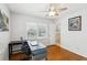Office room showcasing a desk, a chair, hardwood floors and natural light at 2264 Winding Way, Tucker, GA 30084