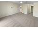 Spacious main bedroom offers neutral carpet and ample natural light at 3705 Tradewinds Dr, Cumming, GA 30041