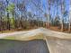 Gravel walking trail through wooded area, enhancing the property's recreational appeal at 3705 Tradewinds Dr, Cumming, GA 30041