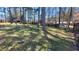 Expansive backyard featuring mature trees and plenty of space for outdoor activities at 4715 Greensprings Rd, College Park, GA 30337