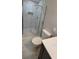 Stylish bathroom boasts a glass-enclosed shower with sleek fixtures, toilet, and a modern vanity at 4715 Greensprings Rd, College Park, GA 30337