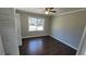 Comfortable bedroom with a ceiling fan and hardwood floors at 4715 Greensprings Rd, College Park, GA 30337