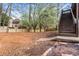 Spacious backyard featuring a staircase to a deck and a classic wooden fence at 113 Willow Hill Ln, Stockbridge, GA 30281