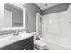 Clean bathroom featuring a shower-tub combo, single sink vanity, and neutral color scheme at 113 Willow Hill Ln, Stockbridge, GA 30281
