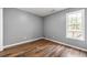 Bedroom with bright windows and new flooring at 113 Willow Hill Ln, Stockbridge, GA 30281