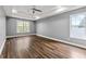 Large main bedroom with a tray ceiling, large windows and new flooring at 113 Willow Hill Ln, Stockbridge, GA 30281