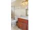 Bathroom with granite vanity, wood cabinets, toilet, tub and shower at 19 Troup Ct, Acworth, GA 30101