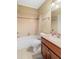 Bathroom with shower and tub combo, vanity with granite countertop, and tile flooring at 19 Troup Ct, Acworth, GA 30101