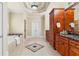 Elegant bathroom featuring double vanity, soaking tub, and decorative tile at 19 Troup Ct, Acworth, GA 30101