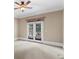 Bedroom with carpet and fan features french doors and neutral paint at 19 Troup Ct, Acworth, GA 30101