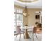Charming dining area featuring a modern table, stylish chairs, and an elegant chandelier at 19 Troup Ct, Acworth, GA 30101