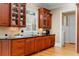 Kitchen space featuring dark wood cabinets, granite countertops, and hardwood flooring at 19 Troup Ct, Acworth, GA 30101
