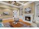 A gorgeous living room featuring a fireplace, hardwood floors, and modern decor at 19 Troup Ct, Acworth, GA 30101