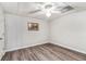 Clean basement with wood look flooring, and recessed lighting, perfect for storage, rec-room, or bonus space at 4150 E East Chapel Hill Rd, Douglasville, GA 30135