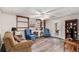 Finished basement space with plank flooring, walkout door, and recessed lighting perfect for recreation or relaxation at 4150 E East Chapel Hill Rd, Douglasville, GA 30135