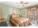 Comfortable bedroom with a queen-sized bed, soft lighting, and neutral tones creating a relaxing atmosphere at 4150 E East Chapel Hill Rd, Douglasville, GA 30135