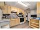 Efficient basement kitchen with neutral cabinetry, modern appliances, and plenty of storage space at 4150 E East Chapel Hill Rd, Douglasville, GA 30135