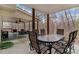 Covered patio featuring ceiling fan and outdoor dining set at 4150 E East Chapel Hill Rd, Douglasville, GA 30135