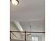Loft area showcasing a railing and view down to the floor below at 450 Pebble Blvd, Covington, GA 30016