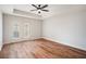 Spacious bedroom with ceiling fan and sliding glass doors to balcony at 50 Biscayne Nw Dr # 5112, Atlanta, GA 30309