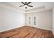 Spacious bedroom with ceiling fan and sliding glass doors to balcony at 50 Biscayne Nw Dr # 5112, Atlanta, GA 30309