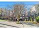 Stately brick condominium building with manicured landscaping and inviting entrance at 50 Biscayne Nw Dr # 5112, Atlanta, GA 30309