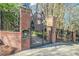 Private property gated entrance with secure access and surveillance camera for added security at 50 Biscayne Nw Dr # 5112, Atlanta, GA 30309