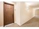 Well-lit hallway with neutral tones, leading to various units in the building at 50 Biscayne Nw Dr # 5112, Atlanta, GA 30309