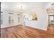 Open-concept space with hardwood floors, with a door to the outside and an open kitchen view at 50 Biscayne Nw Dr # 5112, Atlanta, GA 30309
